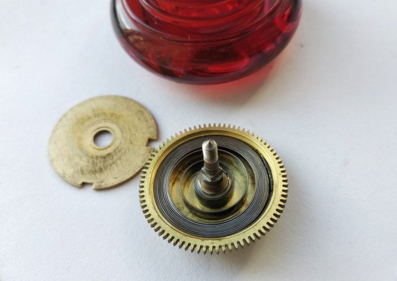 Installing and lubricating going barrel spring