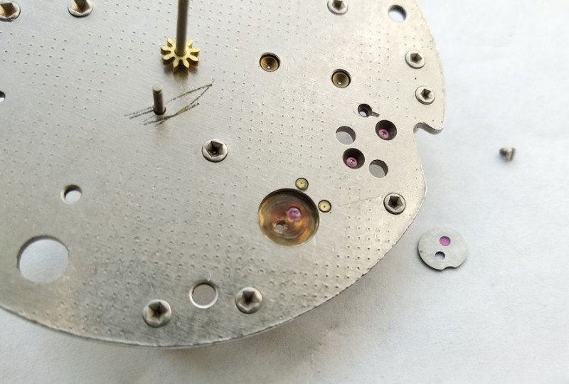 Cleaning balance jewel setting with pith wood