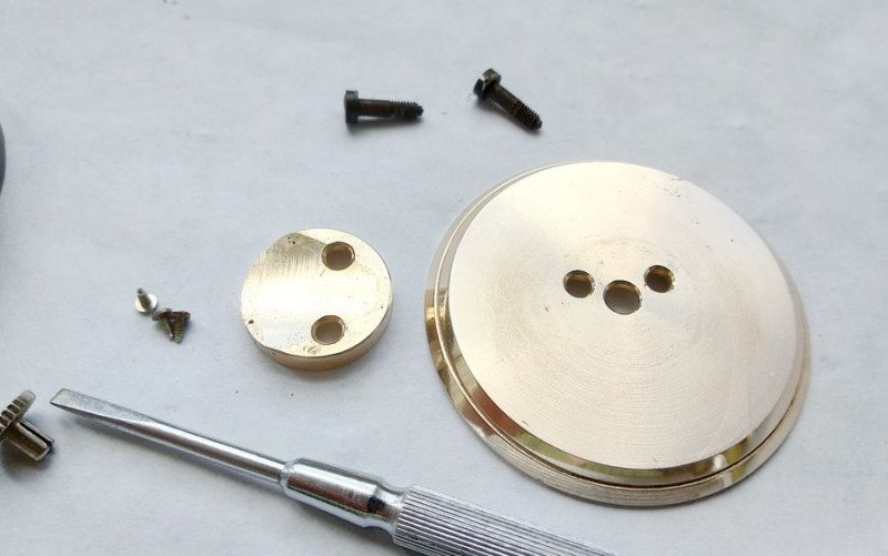 Removing clock stand mounting screws