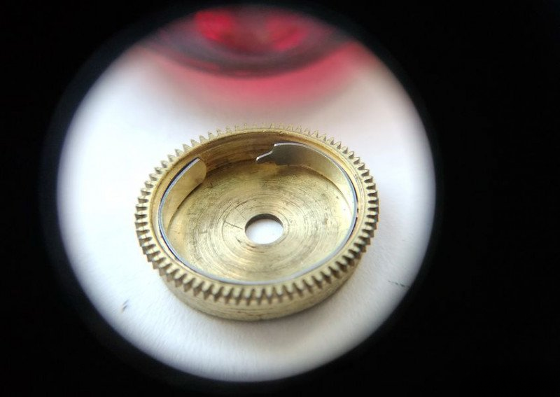 Installing friction spring in alarm barrel