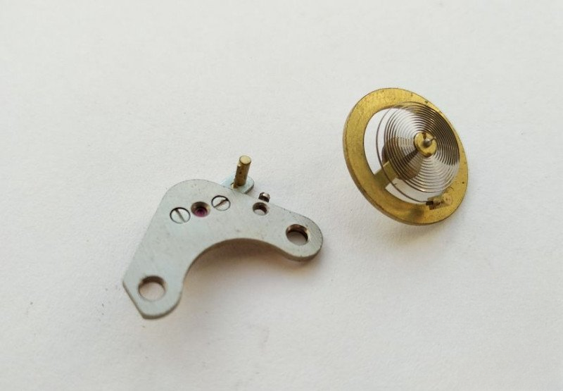 Removing balance wheel for final cleaning