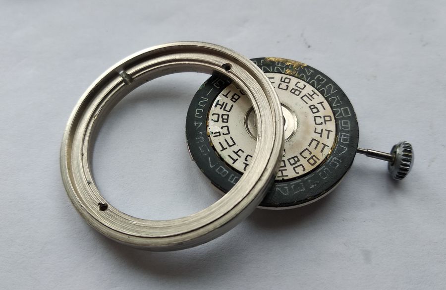 Installing the caliber back into its carrying ring
