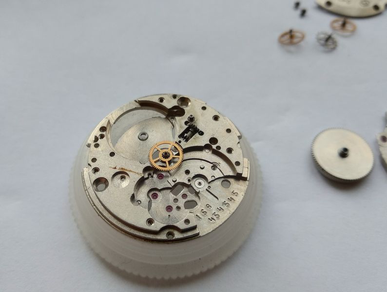 Removing the barrel bridge and mainspring barrel