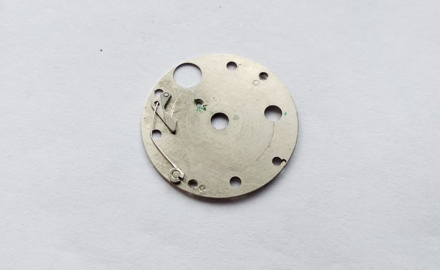 Detailed view of the simple disc detent construction