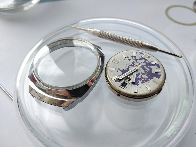 The exterior of the cleaned but aged watch case