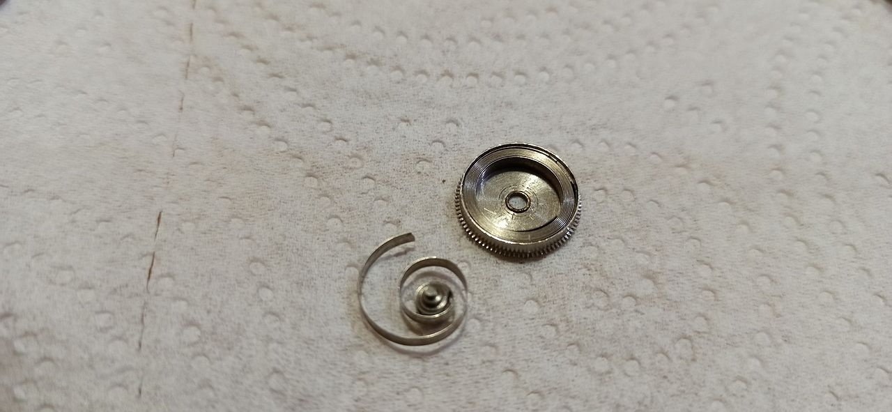 Opened barrel with mainspring, the original found broken