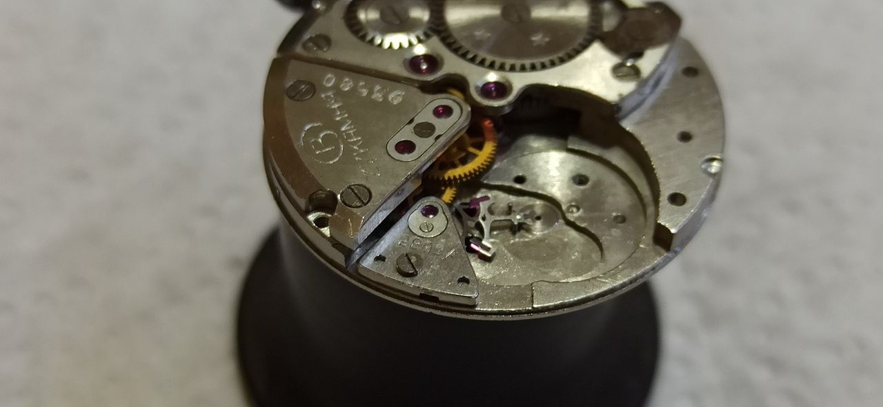Escape wheel and blued pallet fork refitted to the movement