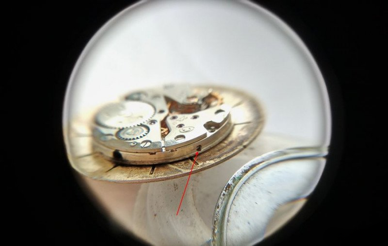 Dial removal showing mounting screws