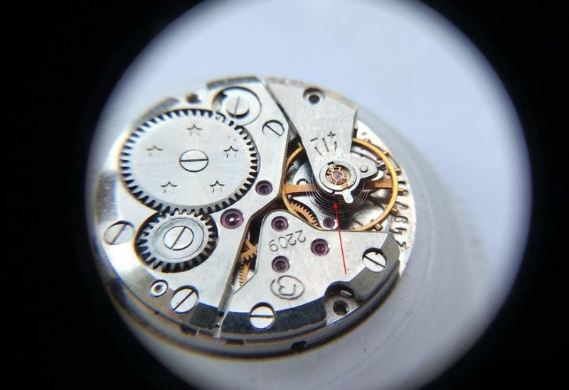 Balance cock showing Breguet overcoil hairspring