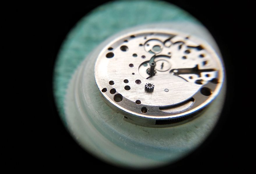 The reverse of the small setting wheel showing its chamfered angled face
