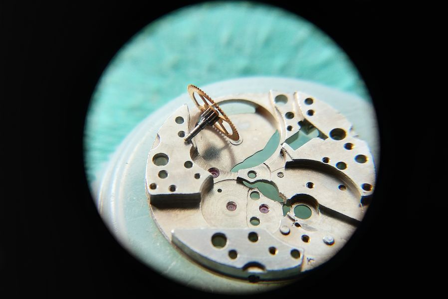 The center wheel being set into position on the main plate