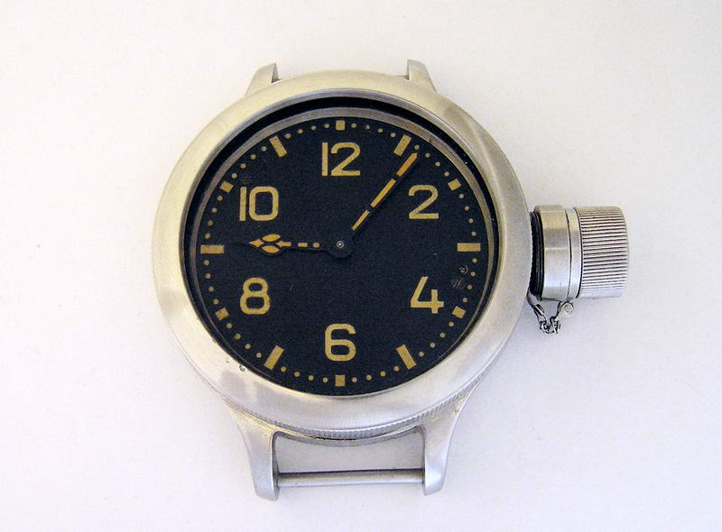 The restored K-43 pocket watch shown cased and complete