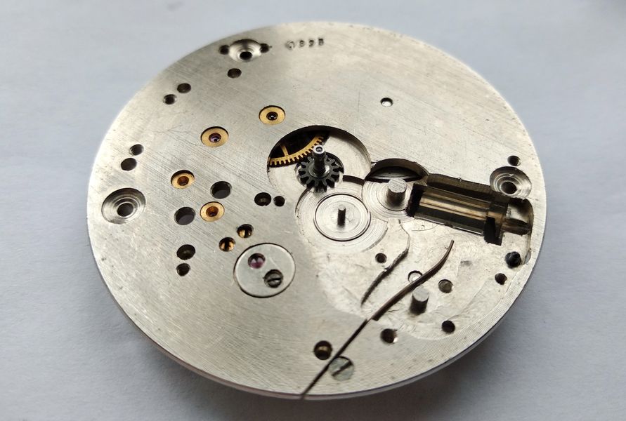 Cannon pinion being refitted on the dial side before the minute wheel