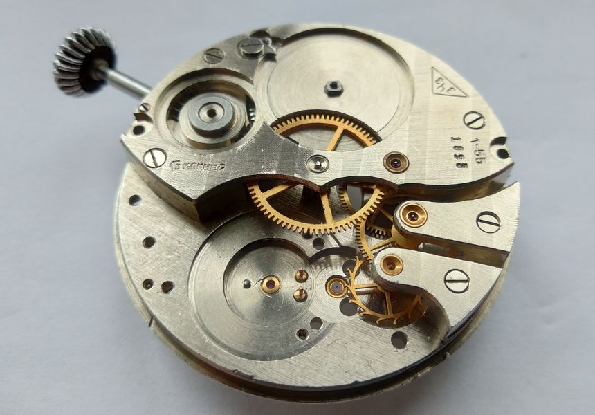 Beginning to assemble the mainspring motor
