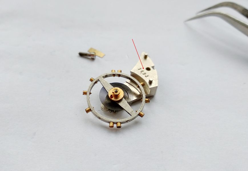 Balance assembly being disassembled for cleaning and lubrication