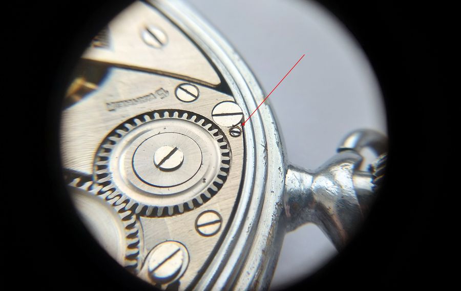 The large winding stem withdrawn from the movement