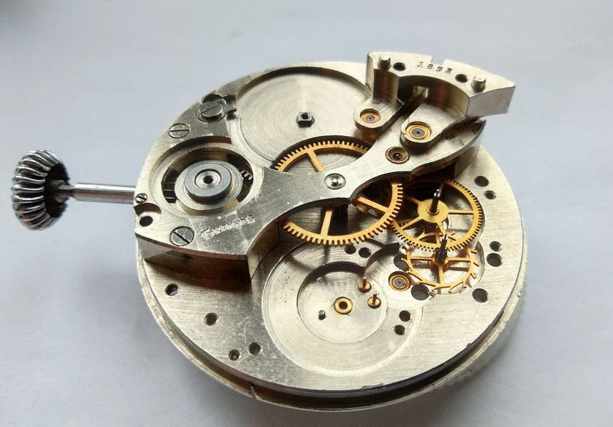 Escape wheel and then the seconds wheel placed onto the plate