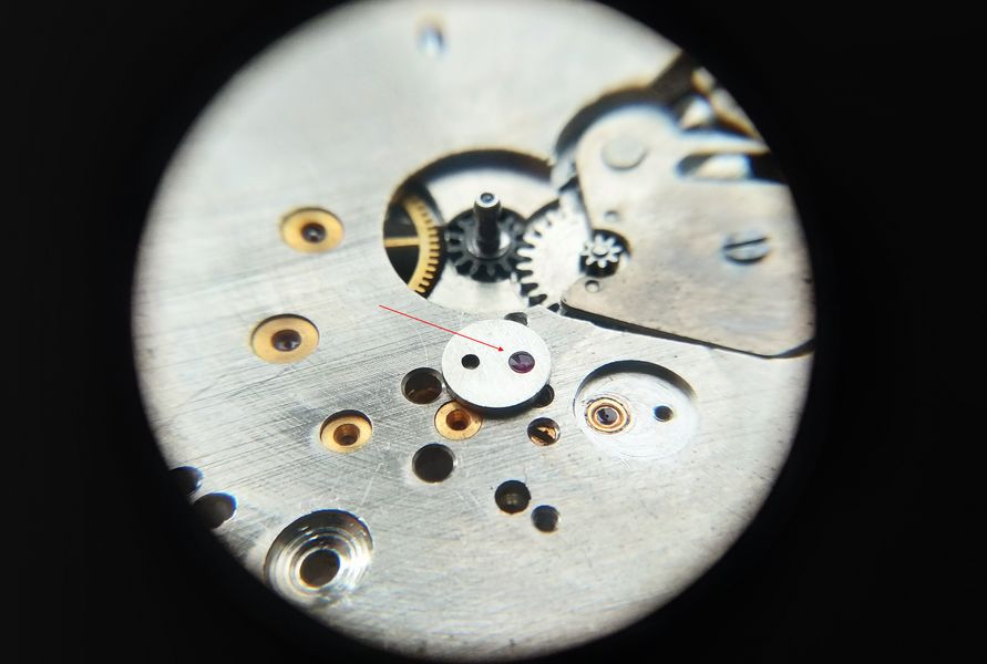 Cap jewel being lubricated with Moebius 8000 oil