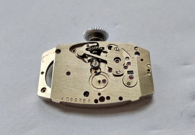 Installing balance cap jewel in position