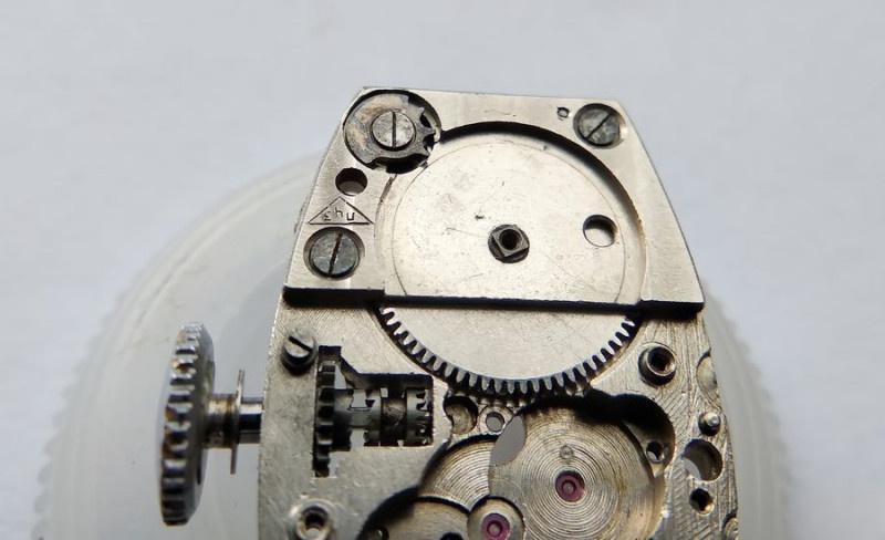 Assembling mainspring assembly with click