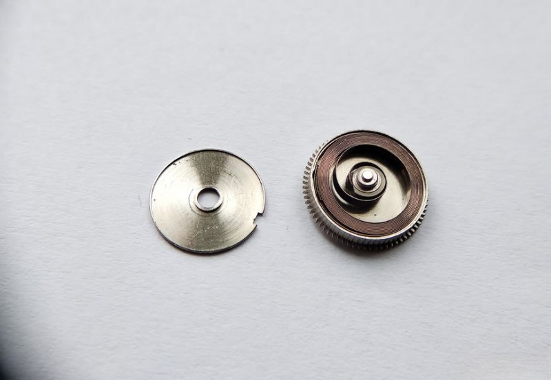 Lubricating installed mainspring