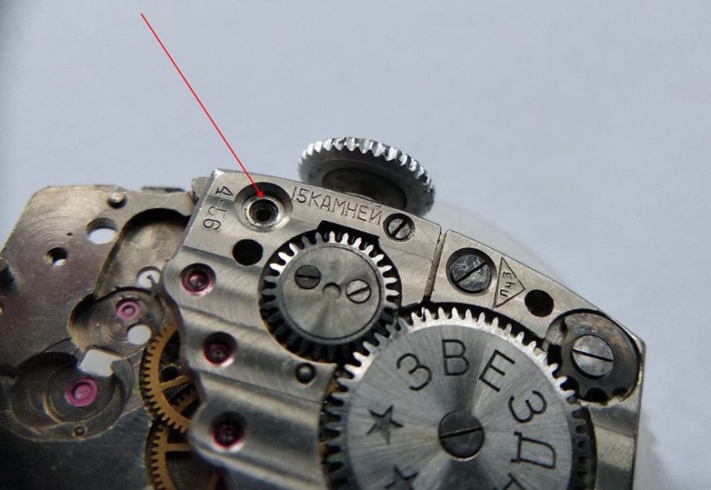 Unscrewing train bridge mounting screws