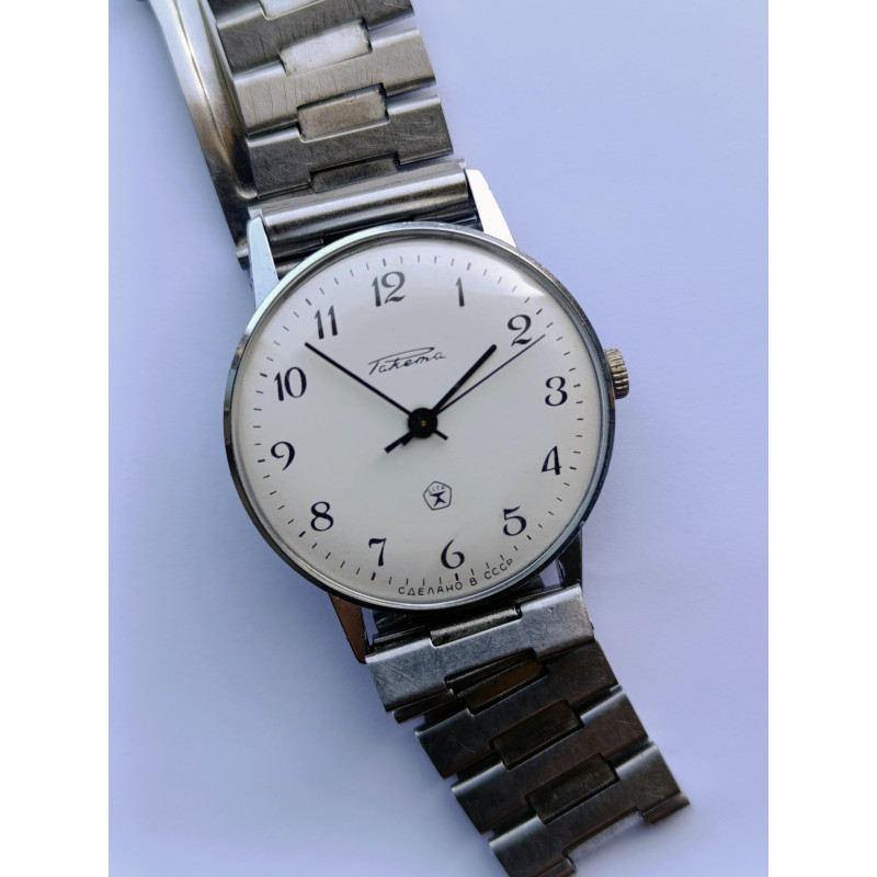 Vintage Soviet Raketa Mechanical Dress Watch – White Enamel Dial Petrodvorets Watch Factory Made in USSR 1970s Vintage Soviet Raketa Mechanical Dress Watch – White Enamel Dial Petrodvorets Watch Factory Made in USSR 1970s